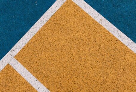 Contour Lines - A close up of a tennis court with blue and yellow lines
