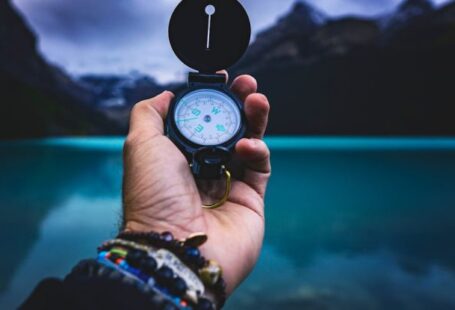 Navigate - Person Holding A Compass