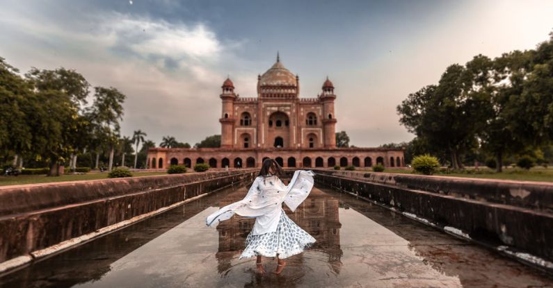 Cultural Landscapes - Photo Of Woman Standing On Water