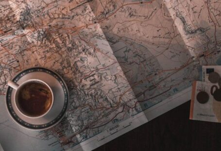 Thematic Maps - White Ceramic Cup on Map