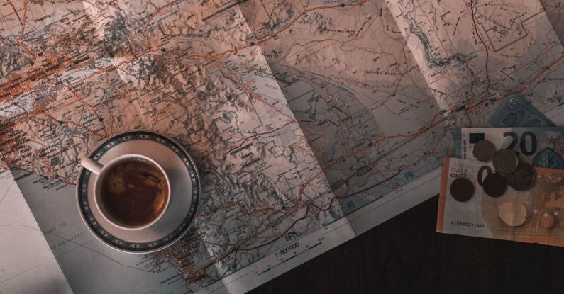 Thematic Maps - White Ceramic Cup on Map