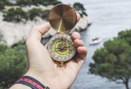 Compass - Person Holding Compass