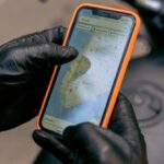 Navigation Apps - A Biker Using a Cellphone for Navigation
