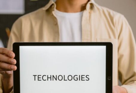 Geospatial Technologies - A Man Holding a Digital Tablet